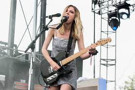 Formed in 2010 as an acoustic duo comprising singer ellie rowsell and guitarist joff oddie, since 2012 wolf alice have also featured bassist theo ellis and drummer joel amey. Wolf Alice S Ellie Rowsell Breaks Down British Festival Girl Style For Glastonbury Vogue