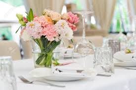 Whatever the celebration, kensington flowers will work closely with you to provide the perfect floral arrangements to suit your taste, room scheme and budget. Flower Table Decorations For Holidays And Wedding Dinner Table Set For Holiday Event Party Or Wedding Reception In Outdoor Restaurant Stock Photo Picture And Royalty Free Image Image 77768859