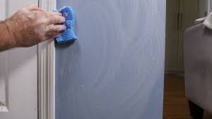 Wipe the wall with the cloth to rinse. How To Clean Walls Cleaning Painted Walls