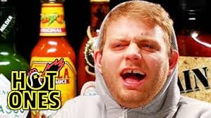 Mac DeMarco Tries to Stay Chill While Eating Spicy Wings (2017)