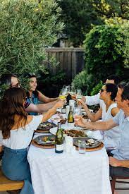 People come together to relax, listen to music, drink wine, and enjoy life. A Tuscan Dinner Party With Camille Styles La Crema