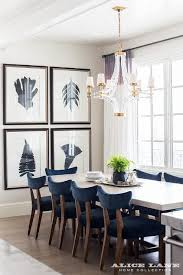 Think wicker or wood to achieve a breezy look, or go the more industrial route with a stylish metal finish. Navy Blue Velvet Dining Chairs With Large Crystal Cube Chandelier Transitional Dining Room Benjamin Moore Gray Mist