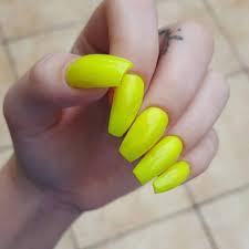Artificial nail enhancements have come a long way, from the thin acrylic nail designs to modern uv gel nails. Short Neon Yellow Acrylic Nails Nail And Manicure Trends