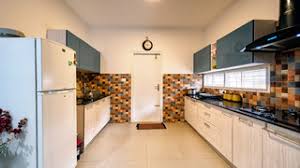 There are cabinets to store essentials and shelves on the top to keep cups and jars that are used regularly, and it also has. Modular Kitchen Photos Designs Ideas