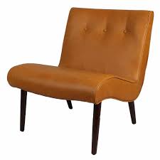 A higher quality reproduction featuring the original specifications and inspired by the handle bars of the vintage adler bicycles the wassily chair is an icon of modern. Caramel Leather Alexa Mid Century Accent Chair Kirklands