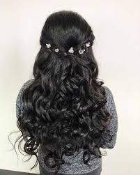 This hair down style for quinceanera will be beautifully completed by a wide pearled headband. Curly Long Hair Quinceanera Hairstyles