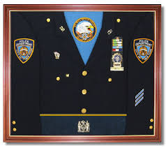 A uniform display case is a simulated uniform, mounted in a special frame using a patent pending until now the only option was a standard blank shadow box on which the awards are displayed in no the uniform display case you receive will be that of a blank uniform, you add your own medals. Samples Uniformdisplaycase Com