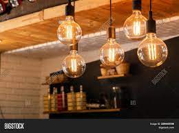 Antique light bulbs, sometimes called edison light bulbs, have clear glass envelopes and visible, sometimes playfully intricate filaments. Led Light Decoration Image Photo Free Trial Bigstock