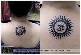 Sun With Om Tattoo Tattoo Sun Tattoodesign Get Inked From Experienced Tattoo Professional Call Sunil C Mantra Tattoo Design Tattoos Om Tattoo Design