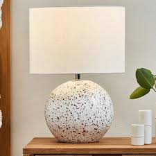 Made from the colourful, glimmering terrazzo, this desk lamp is made for perking up your bedside table or home office. Temple Webster Terrazzo Ceramic Table Lamp