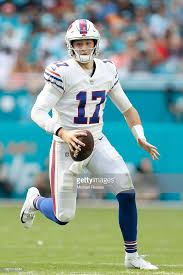 Josh Allen Of The Buffalo Bills Runs With The Ball Against The Miami Buffalo Bills Football Bills Football Buffalo Bills
