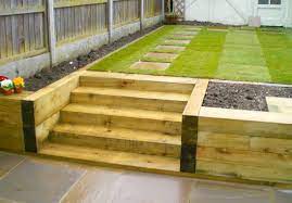 Browse photos of 24 unique garden a traditional gravel path gets an update thanks to decorative stone chips and staggered eden dimension stones that provide a landing spot and engage the eye. Hardwearing Softwood And Hardwood Railway Sleepers