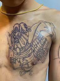 Sus tatuajes, sus pulseras y collares, y su particular forma de peinarse, le dieron a la campaña su toque más trapero. Khea Chahgu Tattoo Photos Facebook