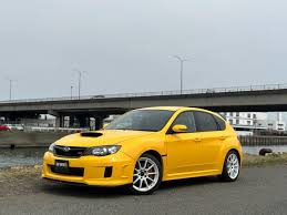 Image result for Herald Yellow 1976 Subaru