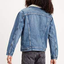 Elle se ferme à l'aide de boutons. Blouson En Jean Fourre Levi S Homme Sherpa Trucker