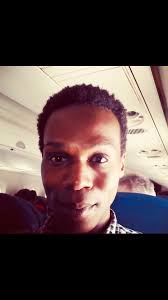 This is a photo of me aboard the plane to NYC