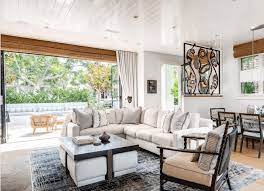 Large glass garage doors open this living room to the outdoors. Inspiration 4 Ways You Can Create Indoor Outdoor Living Spaces