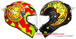 Valentino rossi has gone through several helmet changes but in most of them moon and sun have been a common motif. Agv Valentino Rossi Tribute Helmet Motorbike Writer