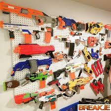 Collect all nerf guns and configure your hooks to fit the guns you have. Nerf Gun Rack