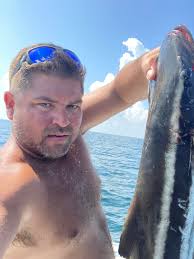 Classic image of a working shrimp trawl between Deer and Biloxi.