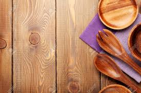 Because of the ideal size, this round kitchen table is a breeze to carry, clean, assemble and alter its places, wonderful designs of this exclusive kitchen table. Wood Kitchen Utensils Over Wooden Table Background With Copy Space Stock Photo Picture And Royalty Free Image Image 36279608