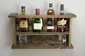 I love all these ideas for upcycling empty jack daniels bottles and turning those empty whiskey bottles into useful and beautiful decor and household items! Rack Dalcool Le Titulaire De Liqueur En Bois Porte De Liquor Rack Drink Display Decor