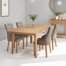 Solid oak is a popular choice for country style interiors. Extendable Dining Set In Solid Oak With 4 Mink Velvet Dining Chairs Adeline Furniture123