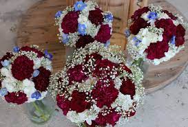 Brides bouquet with greenery, delphinium, roses, freesia & baby's breath. Wedding Flowers Burgundy Wedding Delphinium Baby S Breath Carnations Wedding Flowers Burgundy Burgundy Carnation Bouquet Carnation Bouquet Wedding