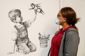 He produces pieces of work which pop up in public places, such as on the walls of buildings. Elusive Banksy New Art Honors Healthcare Workers British Hospital