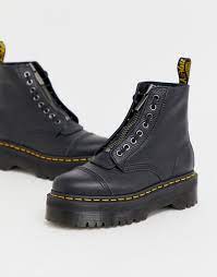 Built with a stacked quad sole and removable jungle zip piece. Dr Martens Sinclair Schwarze Stiefel Aus Gewalktem Leder Mit Reissverschluss Und Flatform Asos