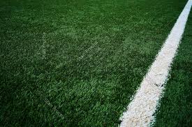 The soccer field is a rectangle playing surface often referred to the soccer field dimensions are defined by law 1 of the laws of the game which are written and. Artificial Green Grass Football Soccer Field Pitch White Stripe Close Up