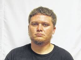 Two Rowland men charged in separate cases across county lines