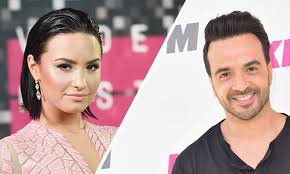 Luis fonsi & daddy yankee] despacito quiero respirar tu cuello despacito deja que te diga cosas al oído para que te acuerdes si no estás conmigo despacito quiero desnudarte a besos dime que no te irás. Demi Lovato And Luis Fonsi Release Song Echame La Culpa Hello