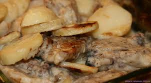 Baked Garlic Chicken And Potatoes Djej W Batata Bil Sayniyyeh Baked Garlic Chicken Baked Chicken And Potato Recipe Recipes