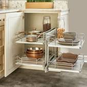 Doors in this cupboard open and folds at an angle making it easy to access large utensils. Corner Organizers Shop For Blind Corner Kitchen Cabinet Optimizers And Corner Units In Heavy Duty Chrome