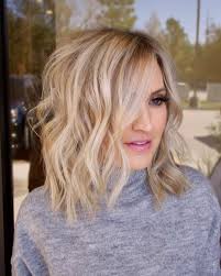 Short layered bob with bangs. The Trendiest Layered Bob Hairstyles Right Now