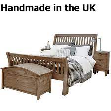 Pin By Modish Living On Handmade In The Uk Reclaimed Wood Beds Reclaimed Wood Bed Frame Wood Beds