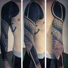 These tattoos are not very simple or plain there are more designs available. 70 All Black Tattoos For Men Blackout Design Ideas