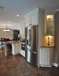 Angled Corner Cabinets With Lighting Draw Microwave Utility Wall With Peninsula And Seating Kitchen Construction Kitchen Cabinet Design Kitchen Remodel