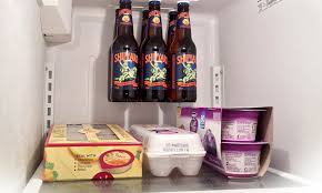 It consists of strong neodymium (grade 52) magnets embedded in narrow plastic rails. Magnetic Strips Taped On A Fridge Ceiling Store Up To Three Beer Bottles To Save Space Daily Mail Online