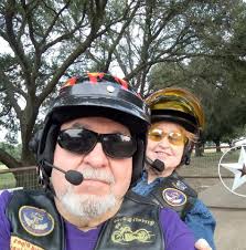 What could cause a Vstrom650 bike to wobble at low speeds with two riders?