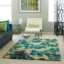 Yes, our dining room, living room, and kitchen were covered with aqua décor. Trending Living Room Color Schemes Marmol Green Living Room Decor Turquoise Rug Living Room Living Room Green