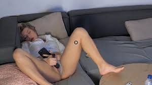 RealLifeCam Harley pussy orgasm with dildo by watching porn on mobile phone