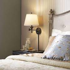 How To Spruce Up Your Spare Bedroom For Houseguests Wall Lamps Bedroom Bedroom Lamps Design Wall Sconces Bedroom