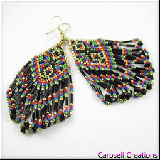 Native American Style Fringe Seed Beaded Earrings A Beautiful Mix Of Red Blue Green Black And Gold Colors Th Beaded Jewels Beaded Earrings Beaded Jewelry