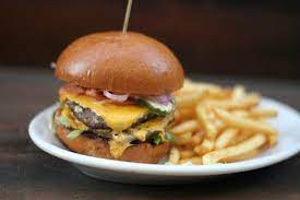 Cheeseburger (value) a fresh and juicy 100% usda choice 4.75 ounce beef patty stacked with melted american cheese, lettuce, tomato and mayo served on a brioche bun. All American Burger Bild Von Lazy Dog Restaurant Bar Orange Tripadvisor