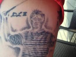 Последние твиты от novak djokovic (@djokernole). This Mystery Man With The Random Davis Love Tattoo Is Probably Pretty Happy Today This Is The Loop Golf Digest