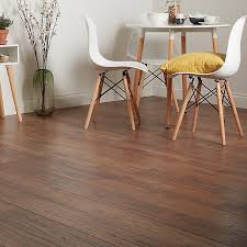 The paint colors and other accessories in the space, such as upholstered furniture and wall decor, should work together to highlight and enhance. Goodhome Otley Brown Dark Oak Effect Laminate Flooring 1 76m Pack Diy At B Q