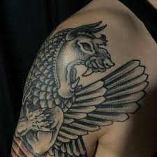 Annihilation — both the book by jeff vandermeer and the film directed by alex garland — is the the tattoo is around from the beginning of the film. Details Of Tiamat The Mother Of Jarva Jarva Tattoo Facebook