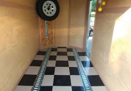Rubber trailer flooring provides good traction and footing for animals. Trailer Flooring Buying Guide